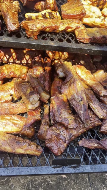Smoked meats filling JT's barbecue pit